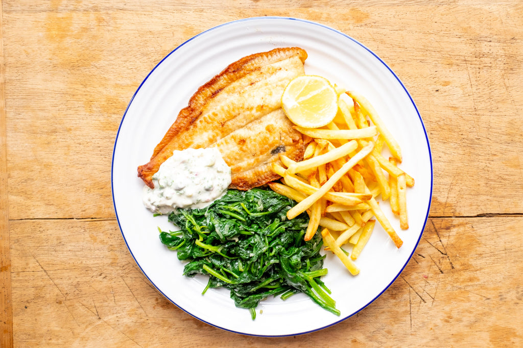 Plaice fried in butter with spinach and chips